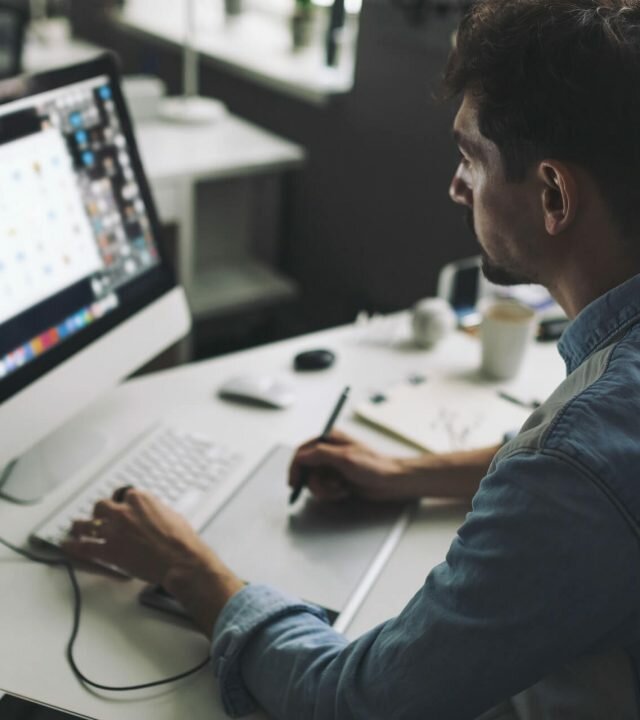 young-graphic-designer-working-office (1) young-graphic-designer-working-office (1)